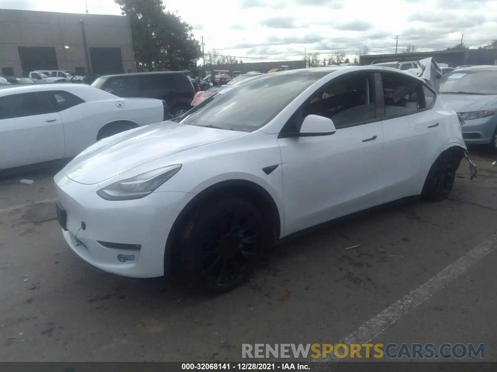 2 Photograph of a damaged car 5YJYGAEEXMF212257 TESLA MODEL Y 2021