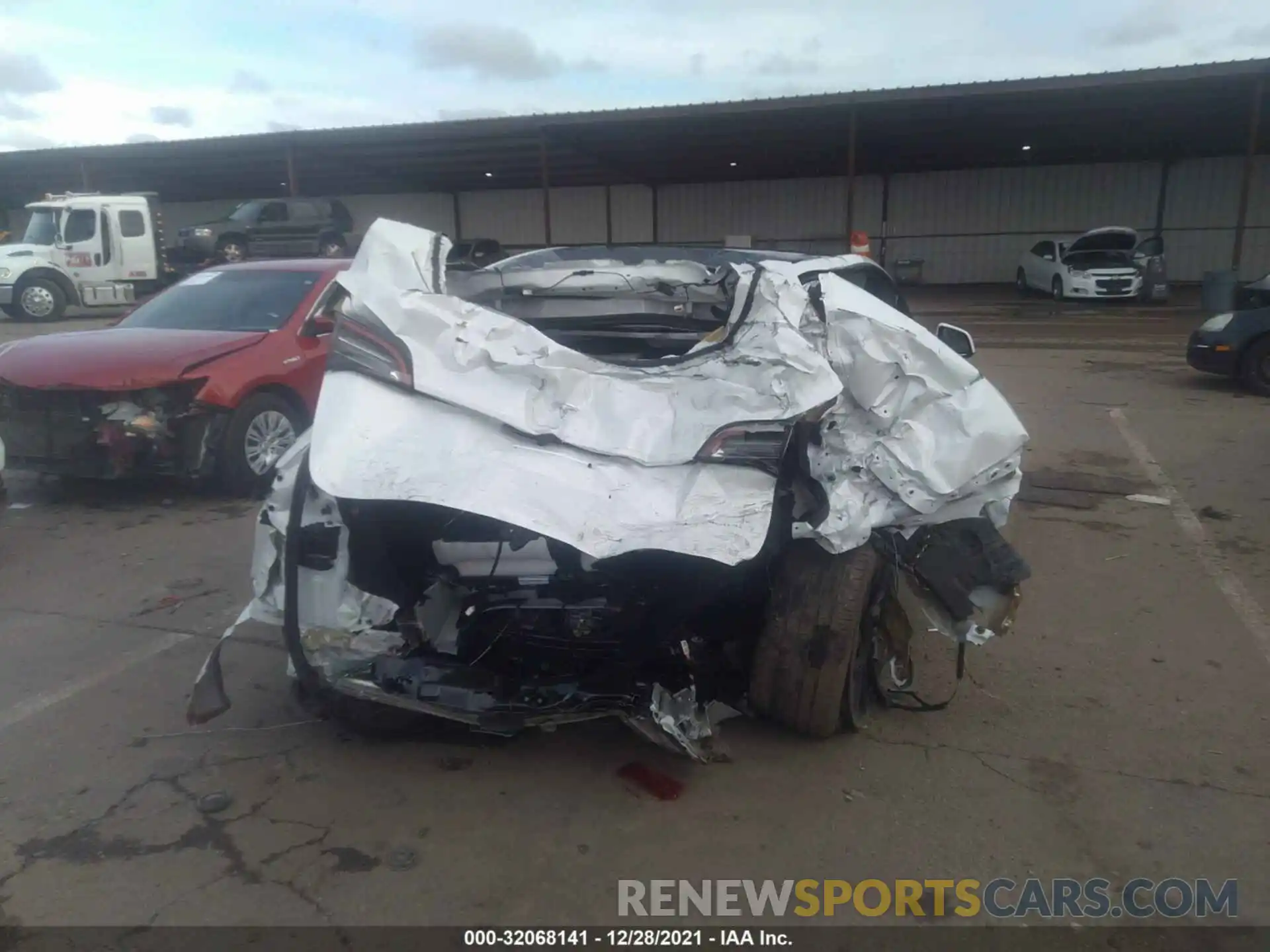 6 Photograph of a damaged car 5YJYGAEEXMF212257 TESLA MODEL Y 2021