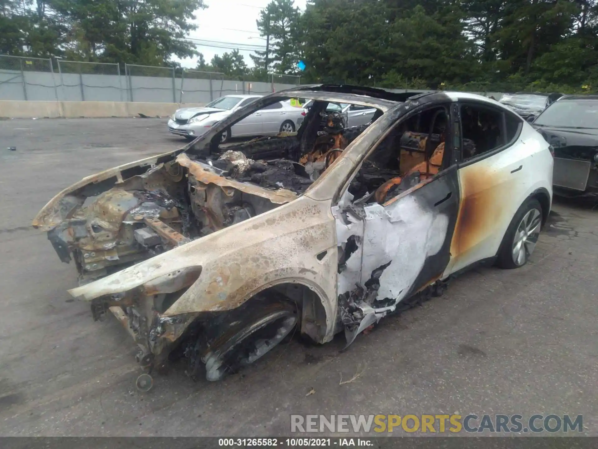 2 Photograph of a damaged car 5YJYGDED0MF105663 TESLA MODEL Y 2021