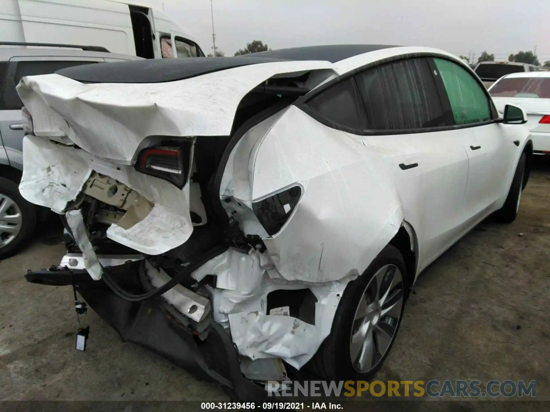 4 Photograph of a damaged car 5YJYGDED0MF107767 TESLA MODEL Y 2021