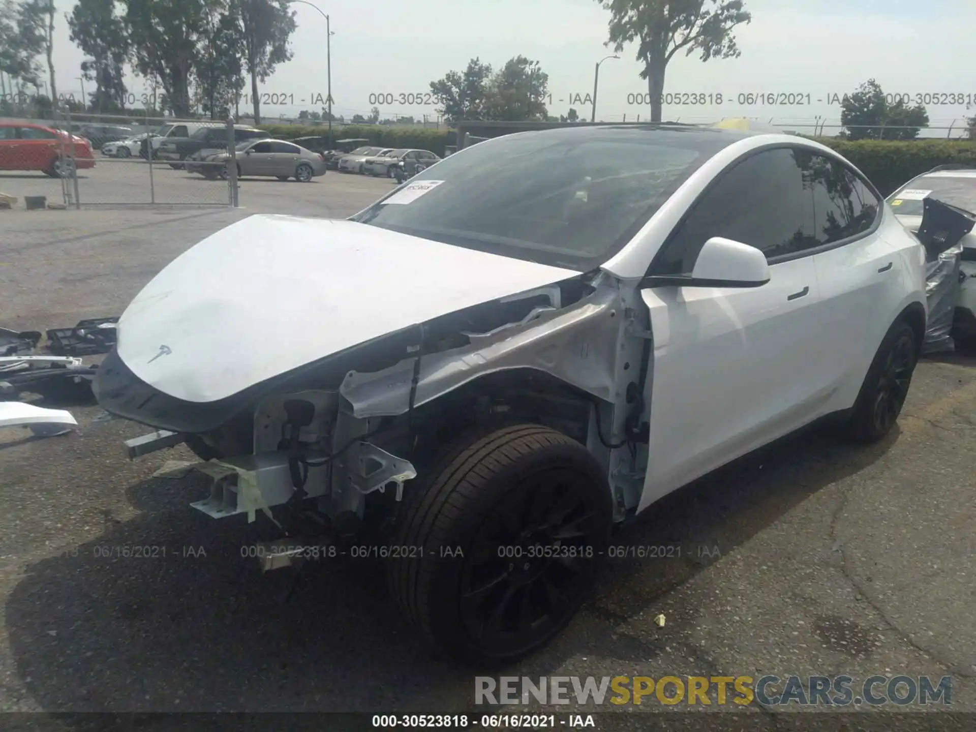 2 Photograph of a damaged car 5YJYGDED1MF125792 TESLA MODEL Y 2021