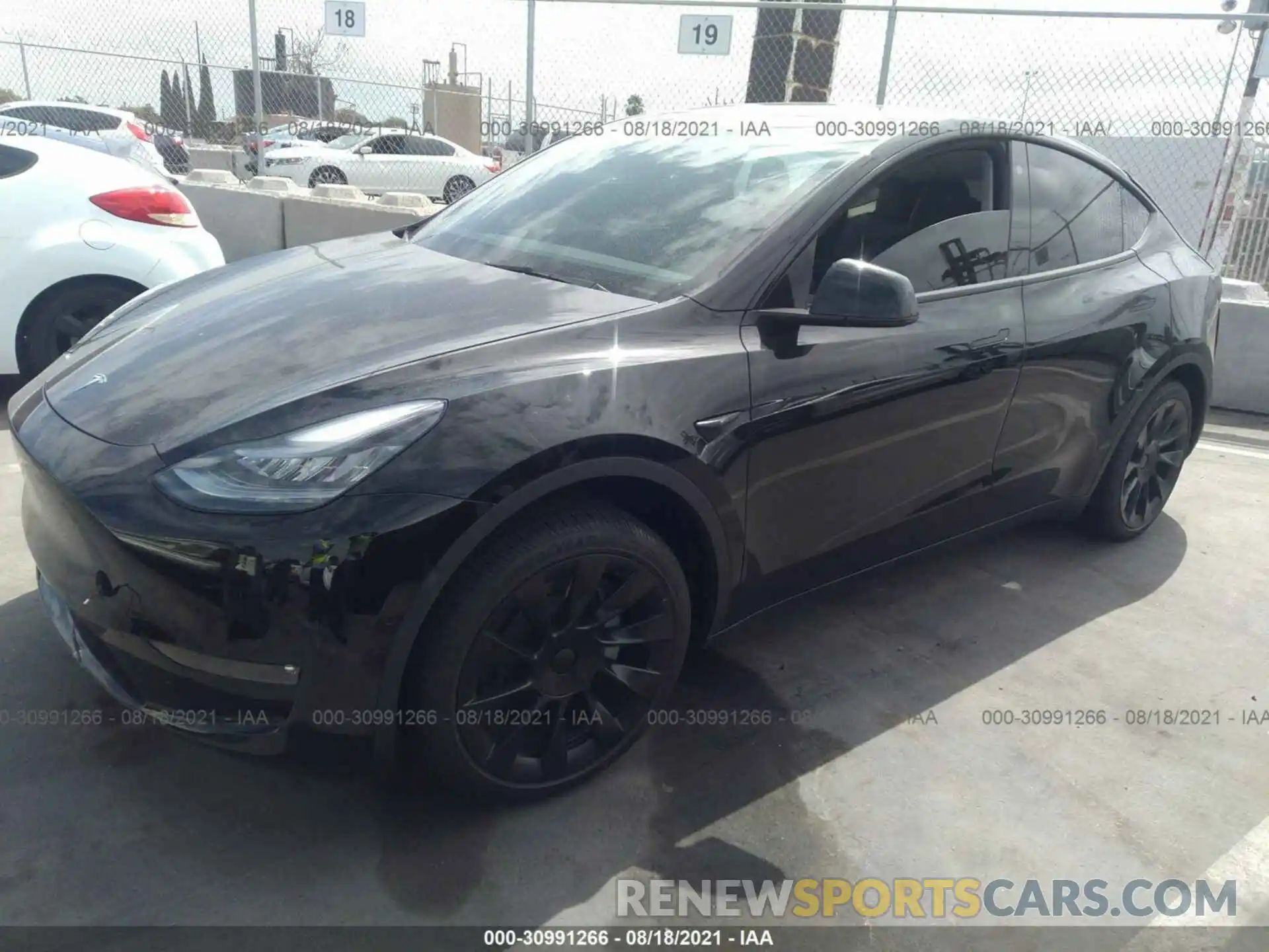 2 Photograph of a damaged car 5YJYGDED1MF173986 TESLA MODEL Y 2021