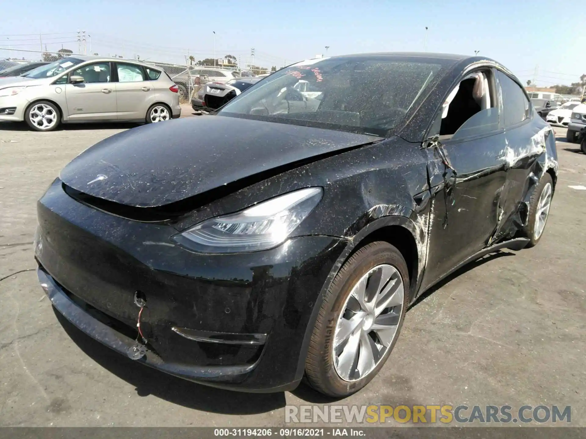 2 Photograph of a damaged car 5YJYGDED2MF107737 TESLA MODEL Y 2021