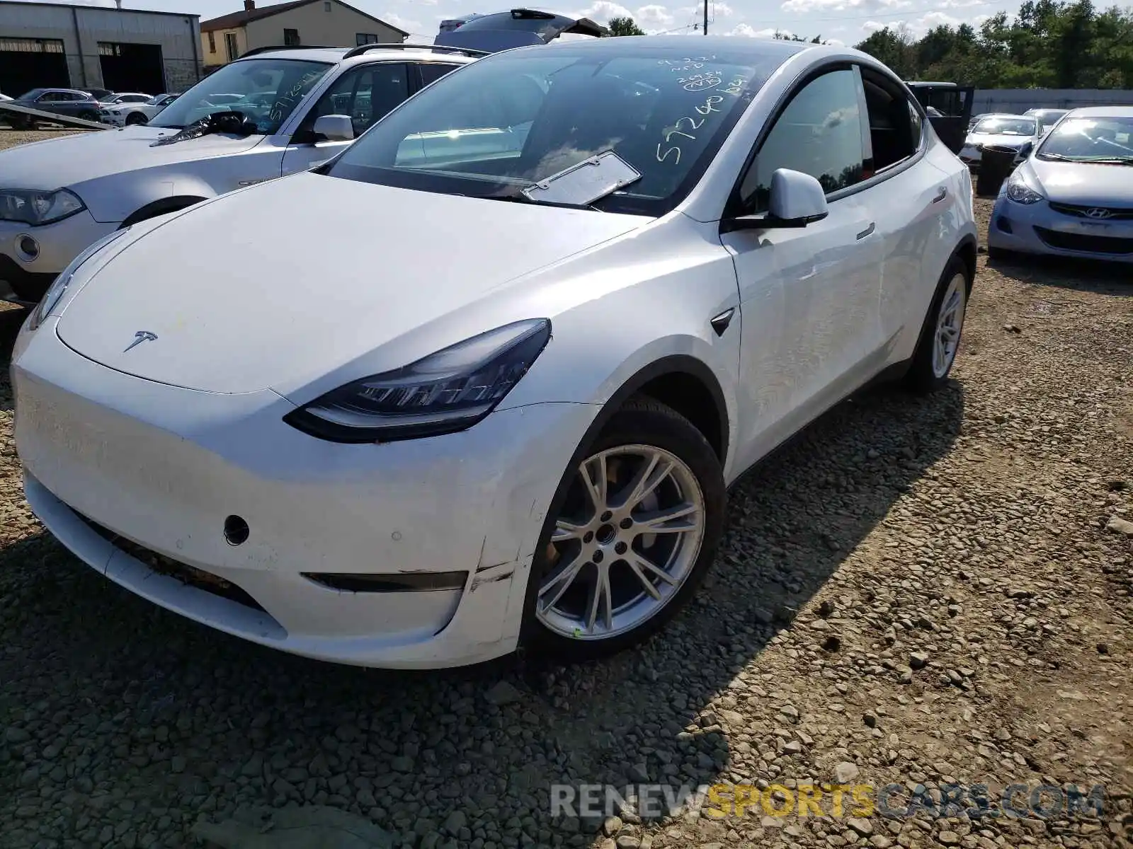 2 Photograph of a damaged car 5YJYGDED3MF105575 TESLA MODEL Y 2021