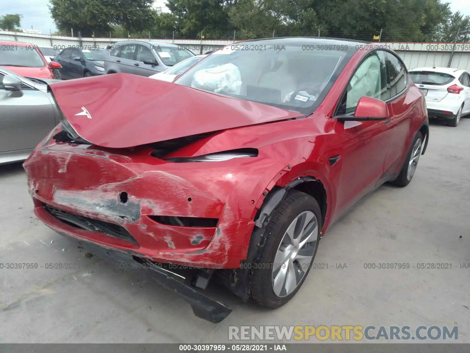 2 Photograph of a damaged car 5YJYGDED3MF107049 TESLA MODEL Y 2021