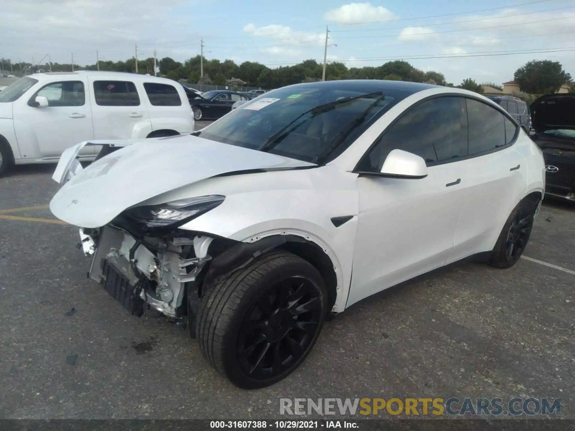 2 Photograph of a damaged car 5YJYGDED3MF108959 TESLA MODEL Y 2021