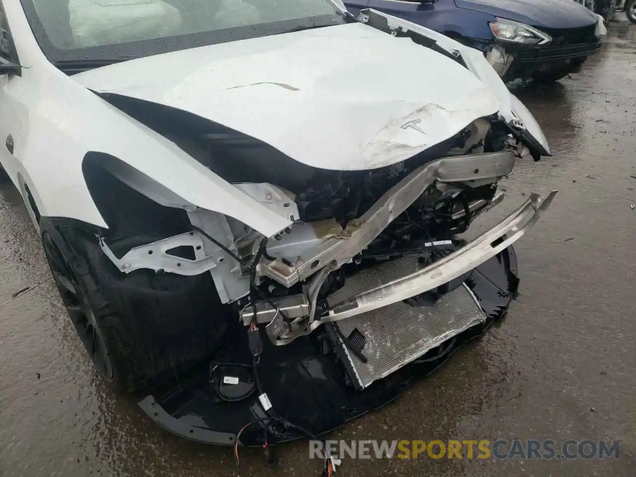 9 Photograph of a damaged car 5YJYGDED5MF122636 TESLA MODEL Y 2021