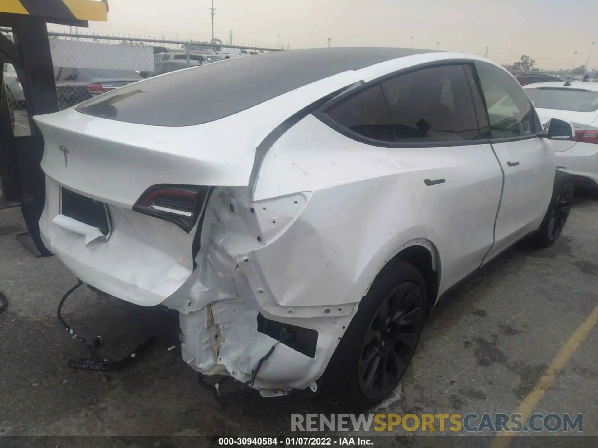 4 Photograph of a damaged car 5YJYGDED5MF192864 TESLA MODEL Y 2021