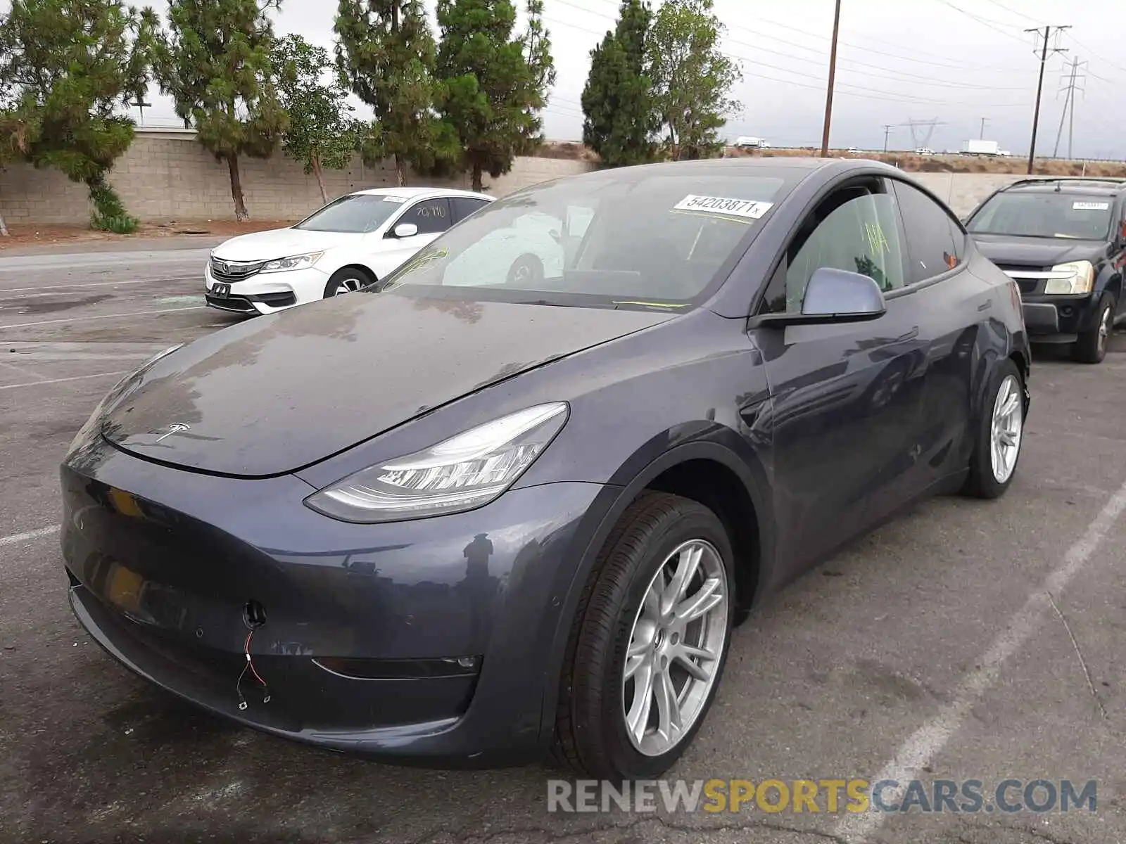 2 Photograph of a damaged car 5YJYGDED6MF133001 TESLA MODEL Y 2021