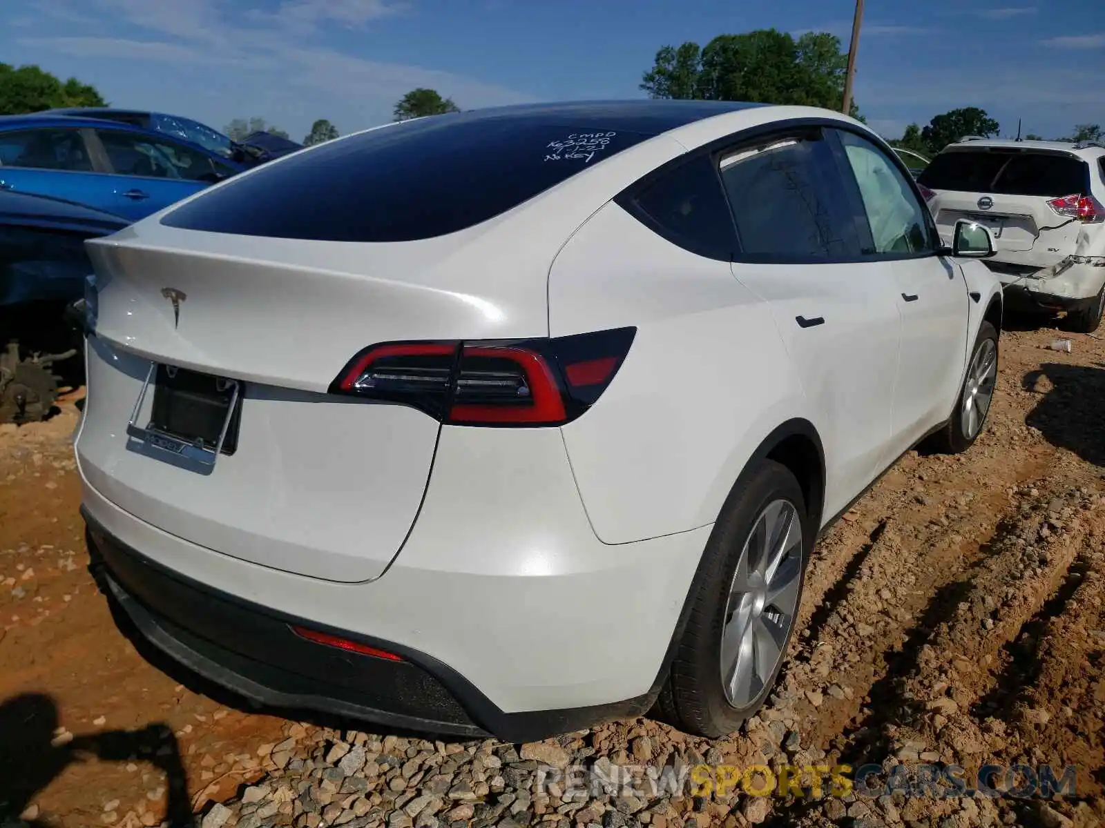 4 Photograph of a damaged car 5YJYGDED6MF163258 TESLA MODEL Y 2021