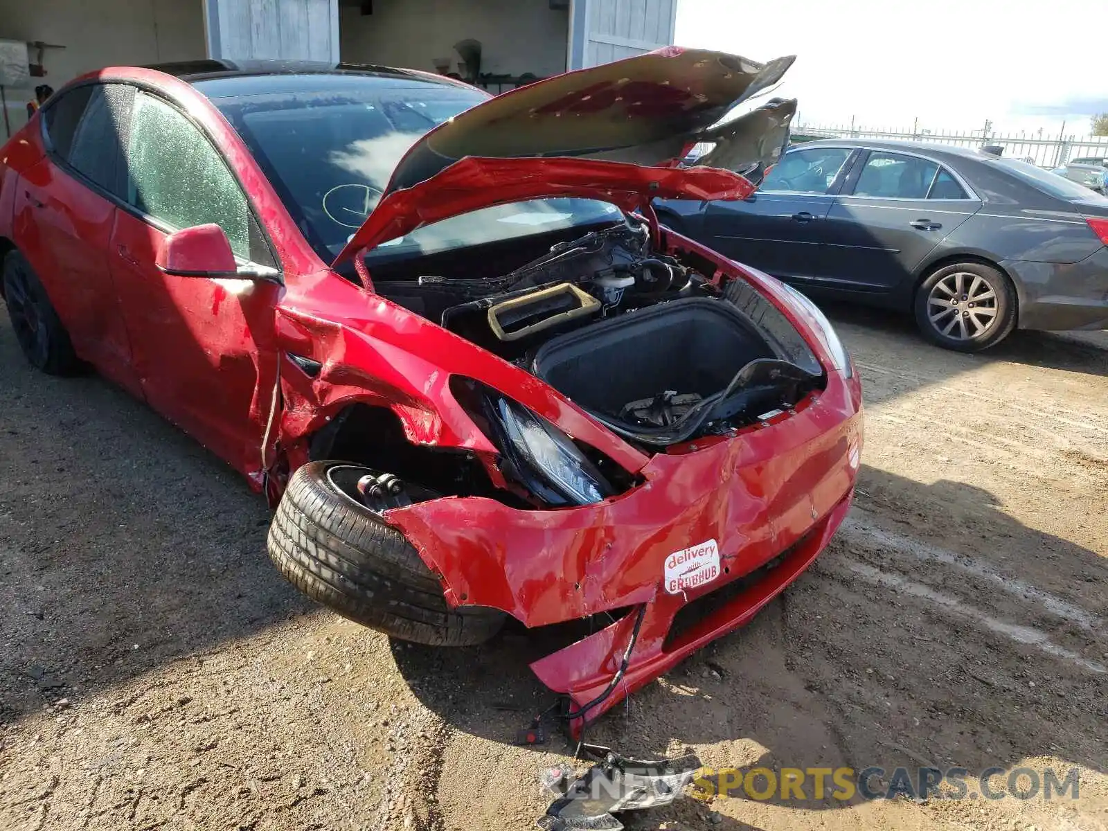 9 Photograph of a damaged car 5YJYGDED8MF103398 TESLA MODEL Y 2021