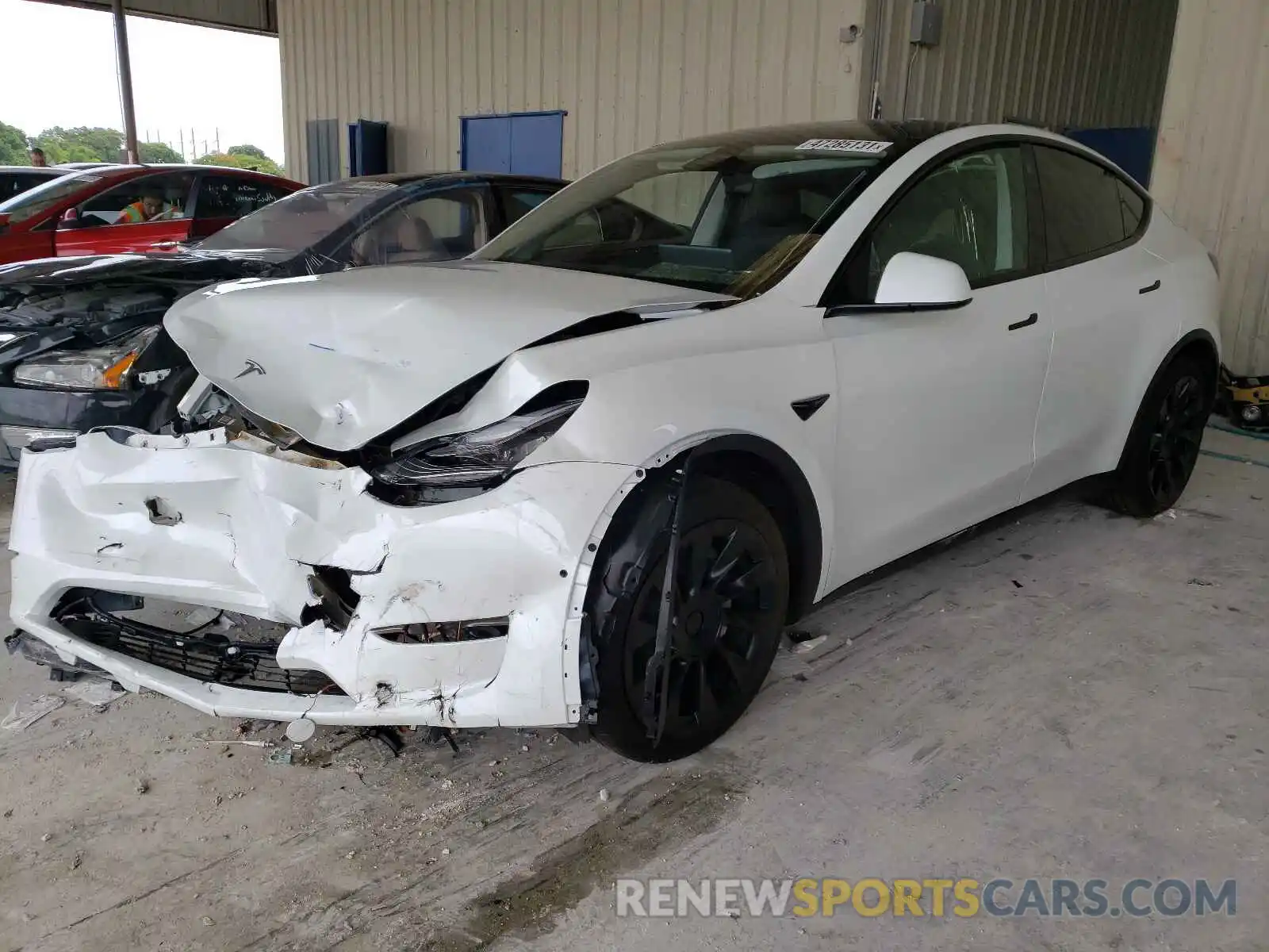 2 Photograph of a damaged car 5YJYGDED8MF103711 TESLA MODEL Y 2021