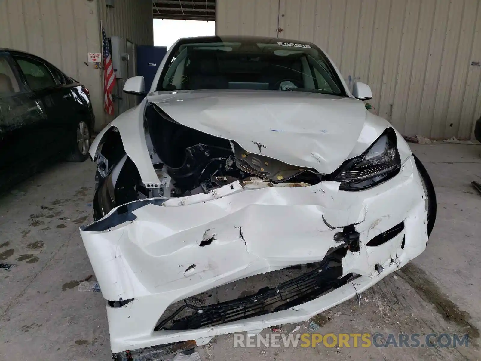 9 Photograph of a damaged car 5YJYGDED8MF103711 TESLA MODEL Y 2021