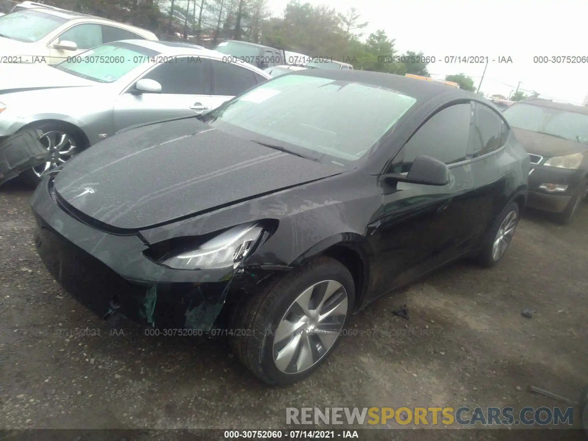 2 Photograph of a damaged car 5YJYGDED8MF107452 TESLA MODEL Y 2021