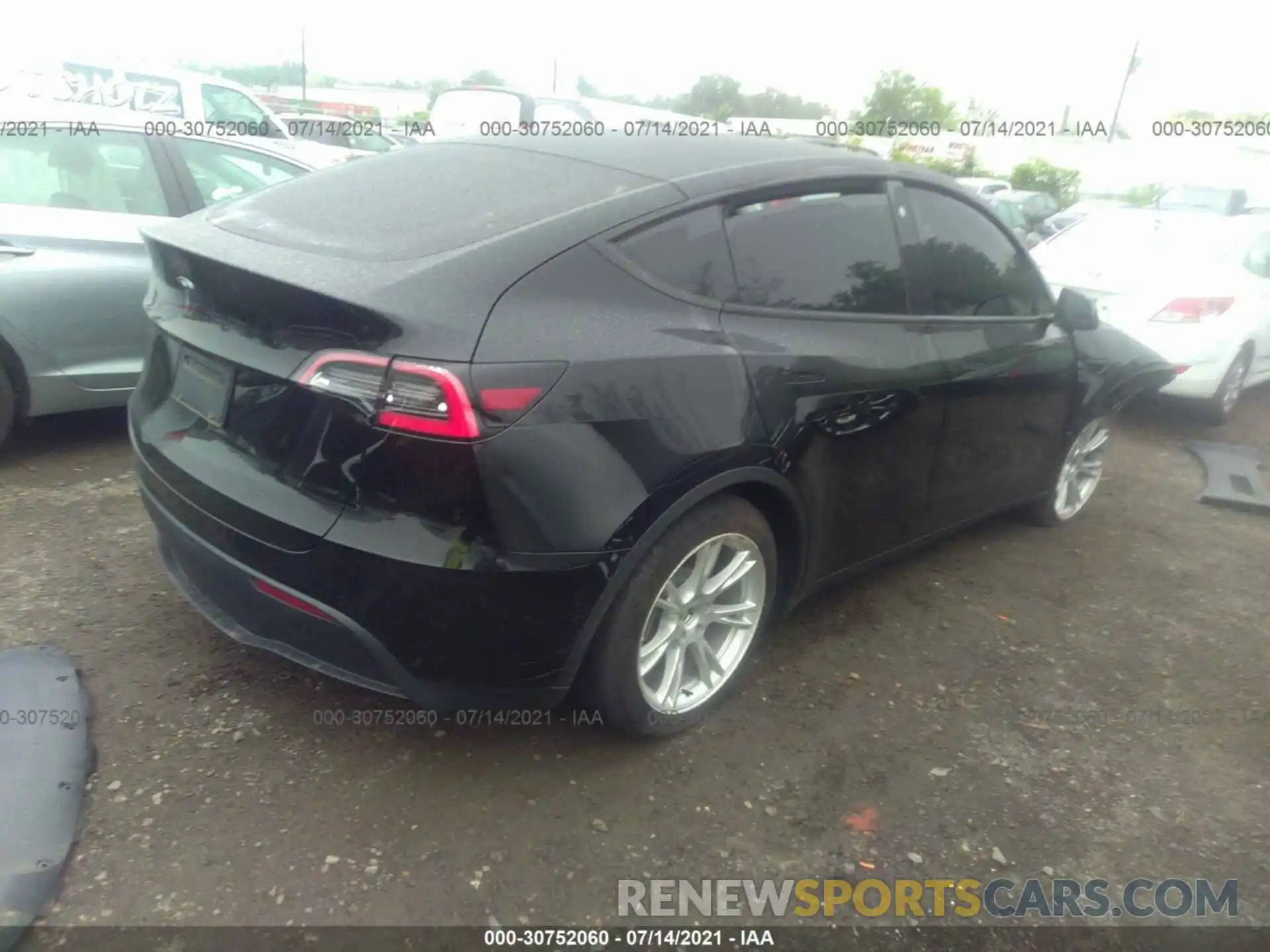 4 Photograph of a damaged car 5YJYGDED8MF107452 TESLA MODEL Y 2021