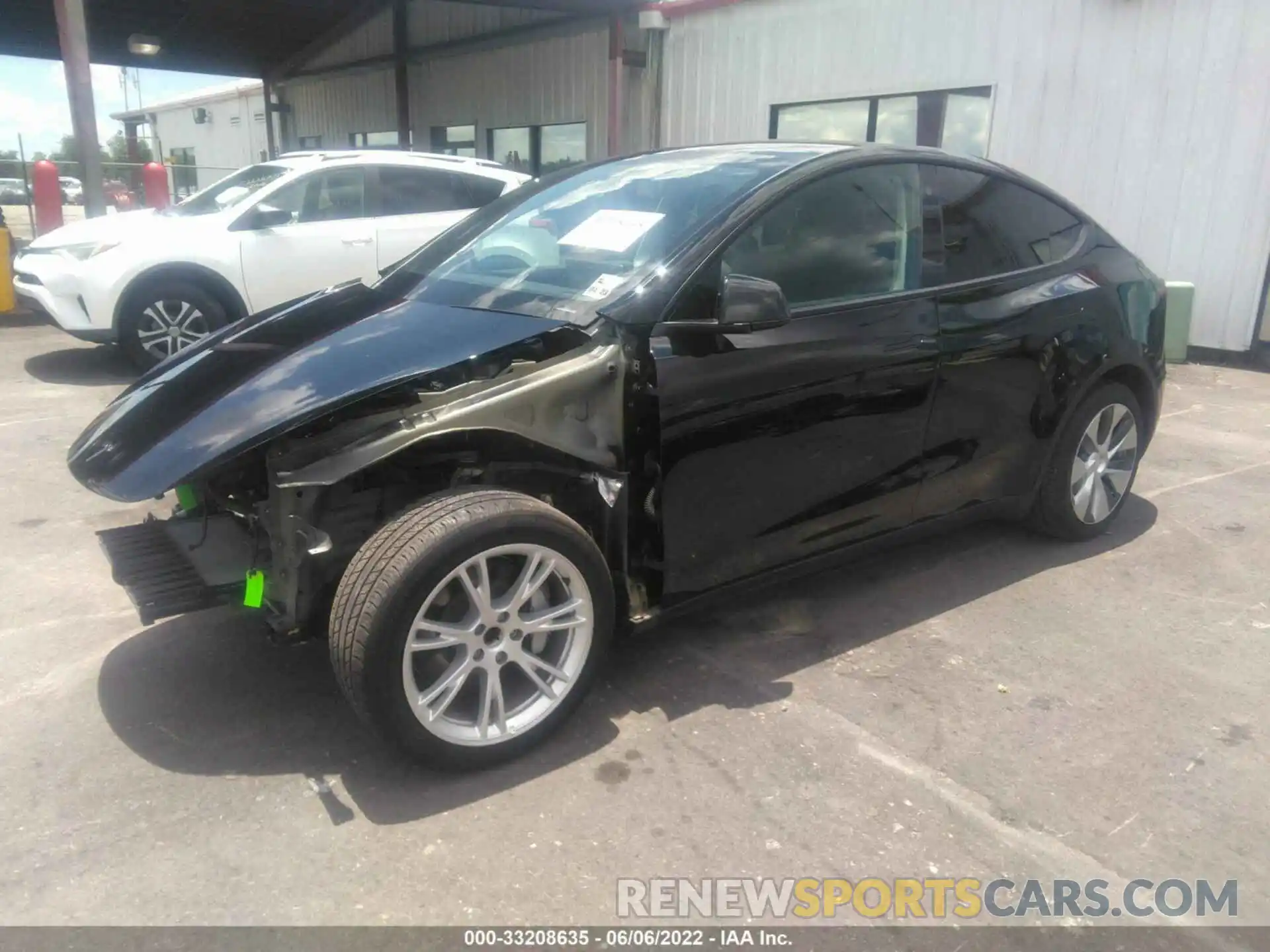 2 Photograph of a damaged car 5YJYGDED9MF103779 TESLA MODEL Y 2021