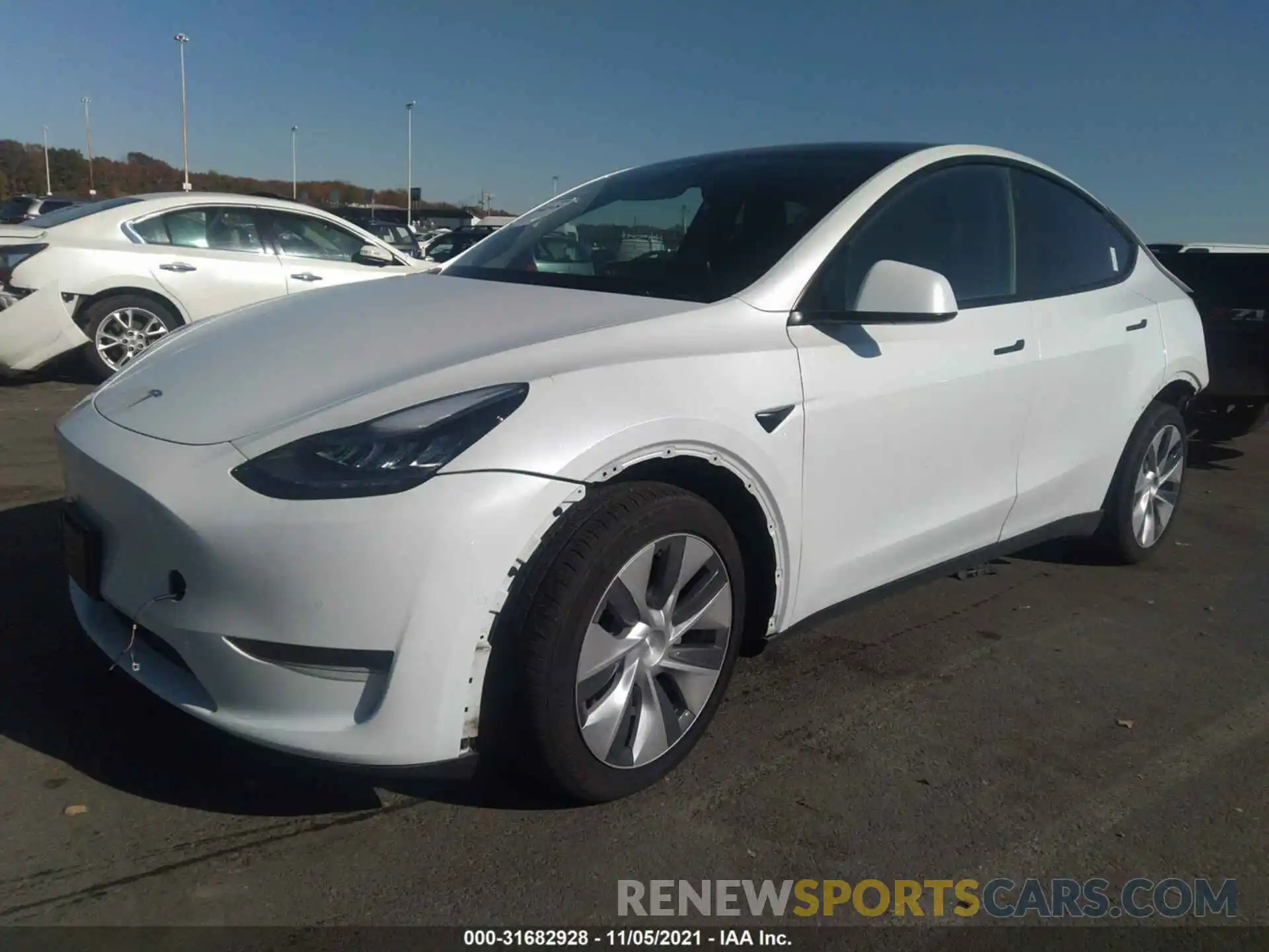 2 Photograph of a damaged car 5YJYGDEE0MF072785 TESLA MODEL Y 2021