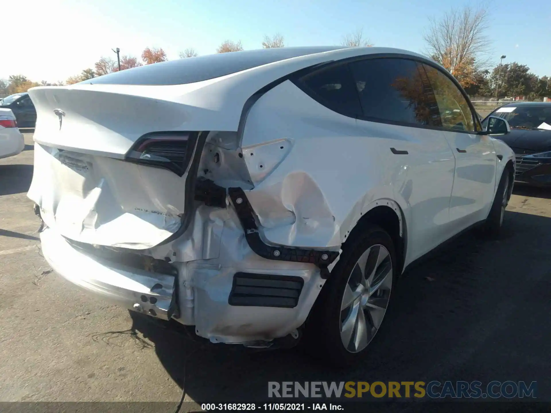 4 Photograph of a damaged car 5YJYGDEE0MF072785 TESLA MODEL Y 2021