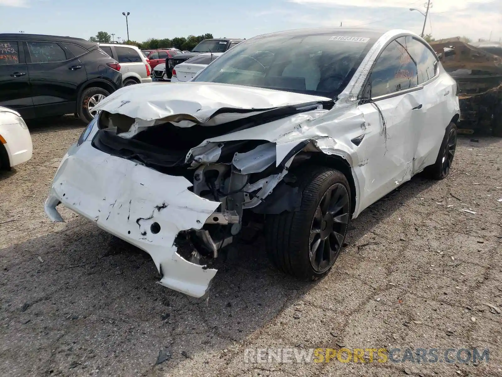 2 Photograph of a damaged car 5YJYGDEE0MF074245 TESLA MODEL Y 2021