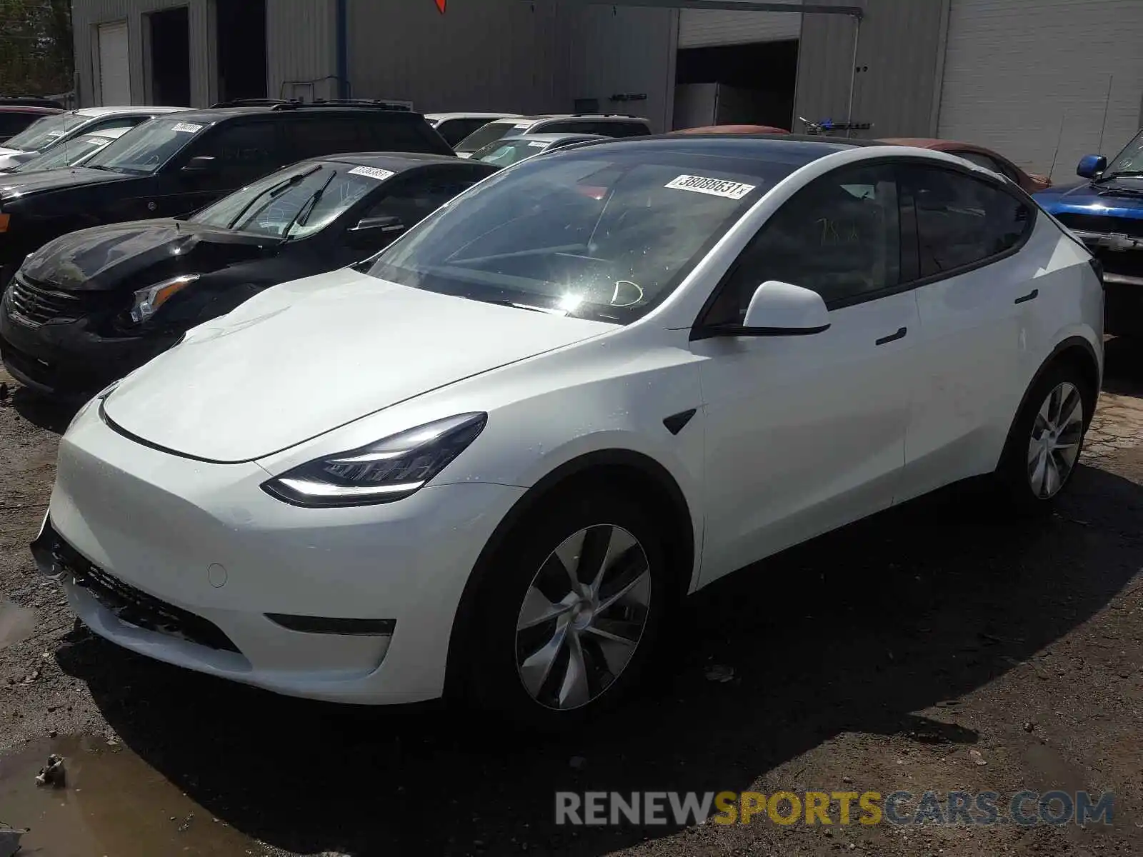 2 Photograph of a damaged car 5YJYGDEE0MF118812 TESLA MODEL Y 2021