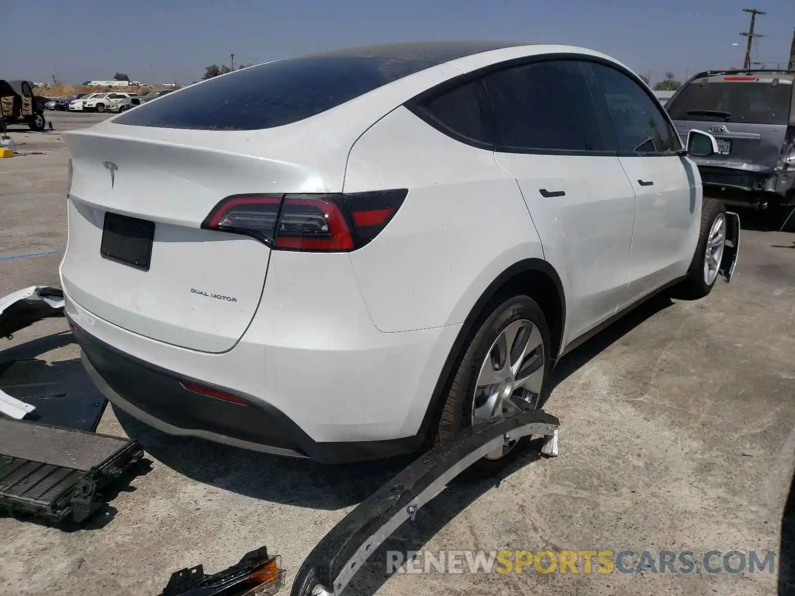 4 Photograph of a damaged car 5YJYGDEE0MF207019 TESLA MODEL Y 2021