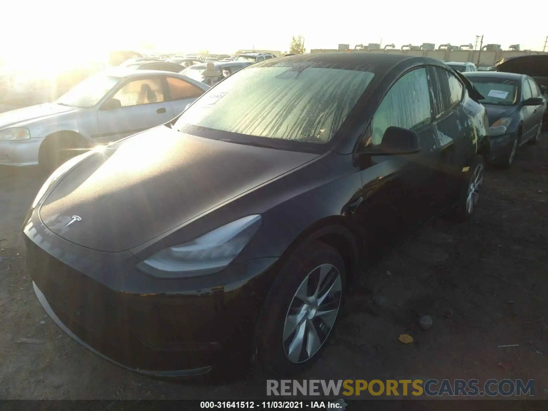 2 Photograph of a damaged car 5YJYGDEE0MF231806 TESLA MODEL Y 2021