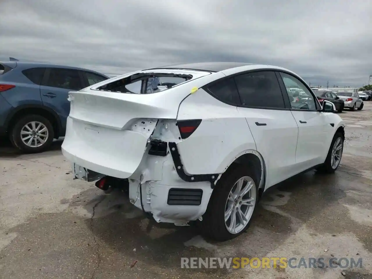 4 Photograph of a damaged car 5YJYGDEE0MF296302 TESLA MODEL Y 2021