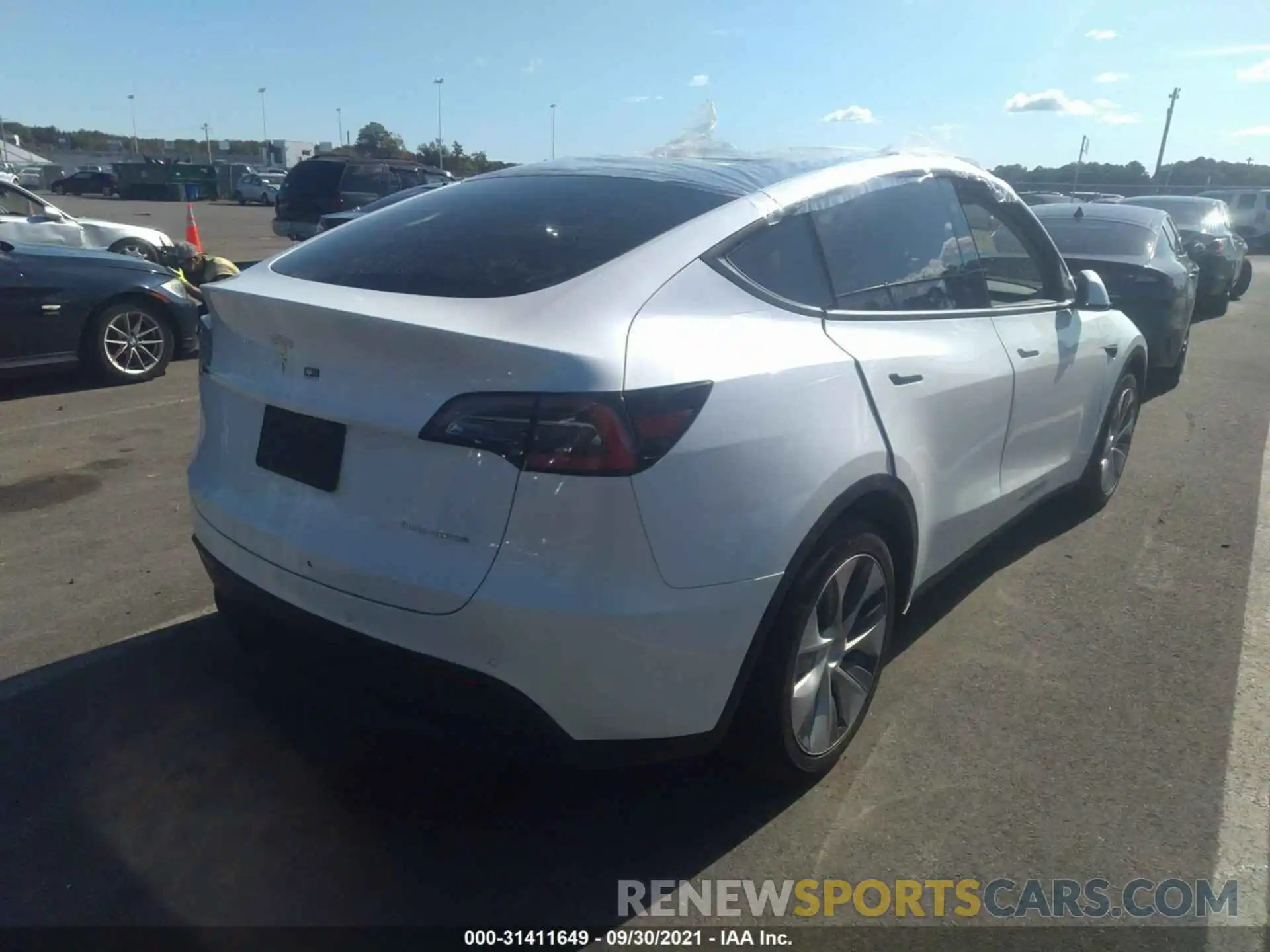 4 Photograph of a damaged car 5YJYGDEE1MF072777 TESLA MODEL Y 2021