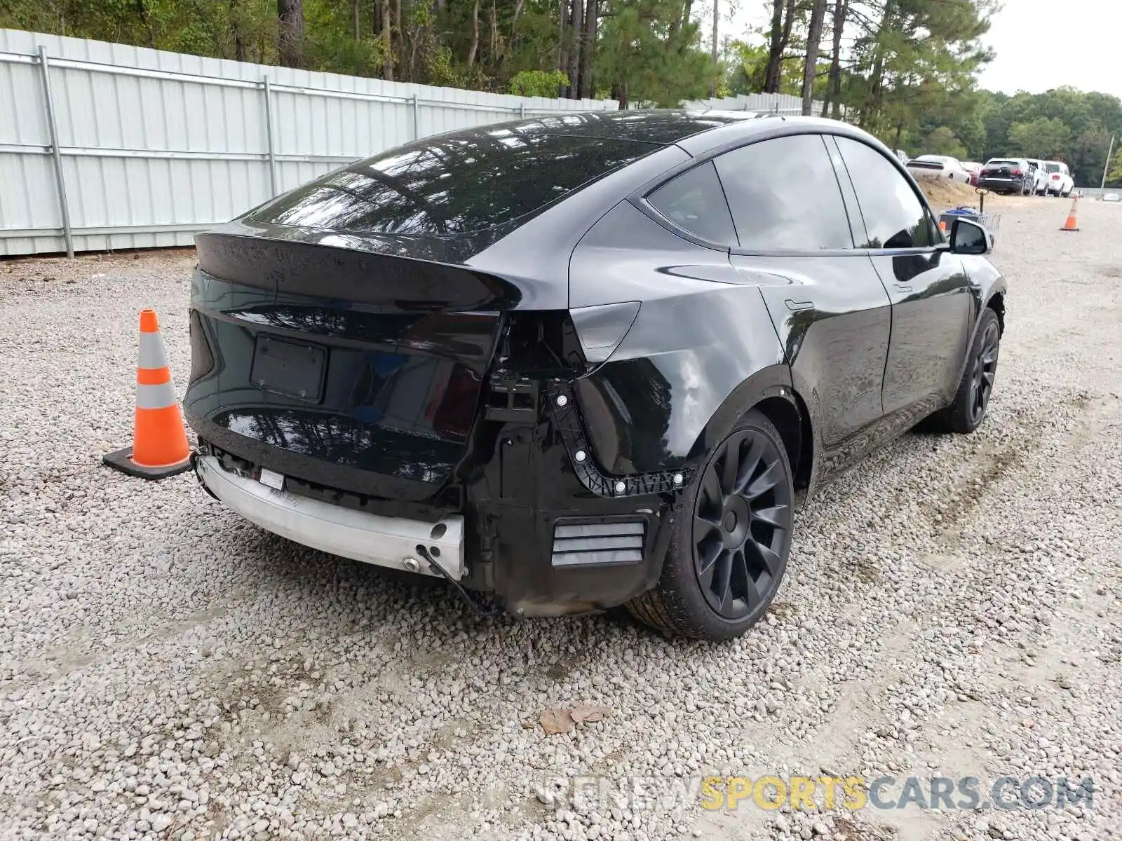 4 Photograph of a damaged car 5YJYGDEE1MF084573 TESLA MODEL Y 2021