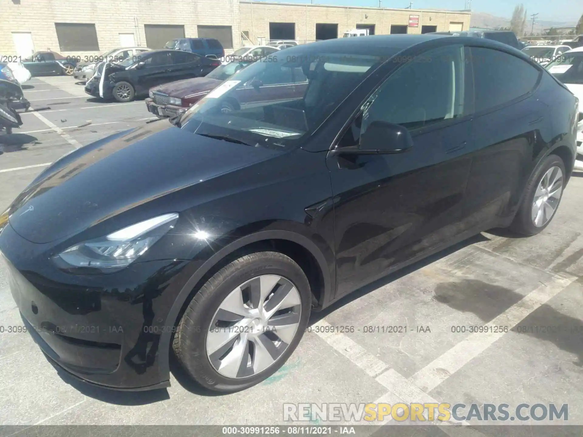 2 Photograph of a damaged car 5YJYGDEE1MF214349 TESLA MODEL Y 2021