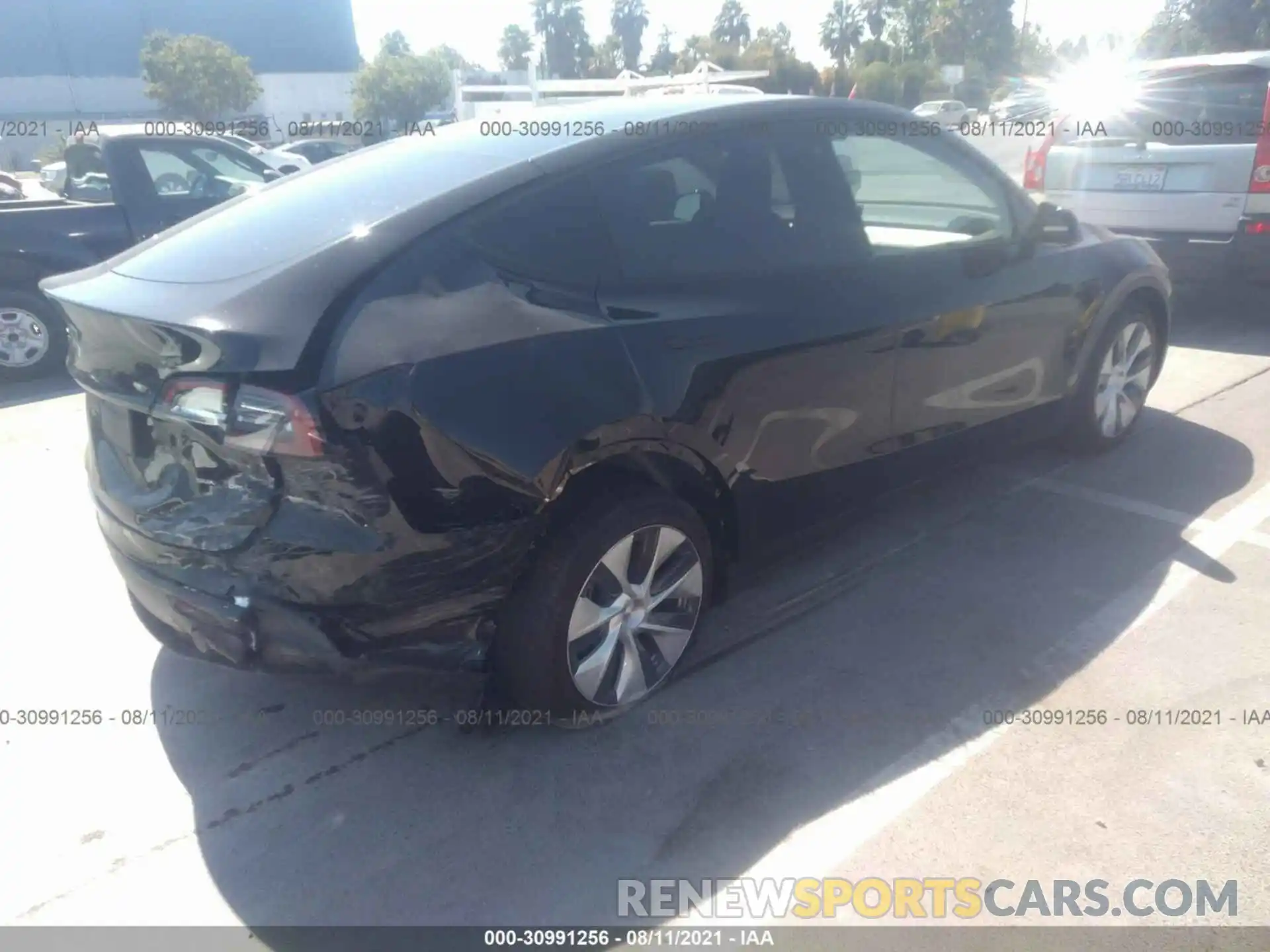 4 Photograph of a damaged car 5YJYGDEE1MF214349 TESLA MODEL Y 2021