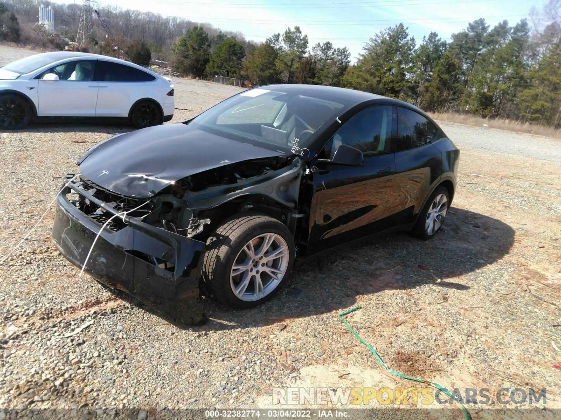 2 Photograph of a damaged car 5YJYGDEE2MF060170 TESLA MODEL Y 2021