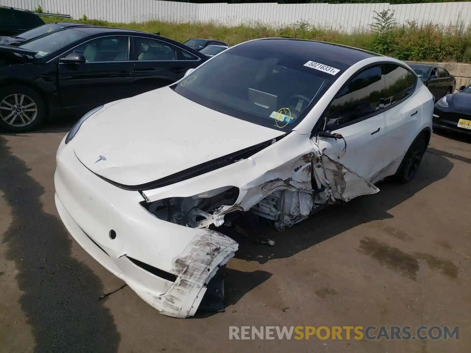 2 Photograph of a damaged car 5YJYGDEE2MF060525 TESLA MODEL Y 2021