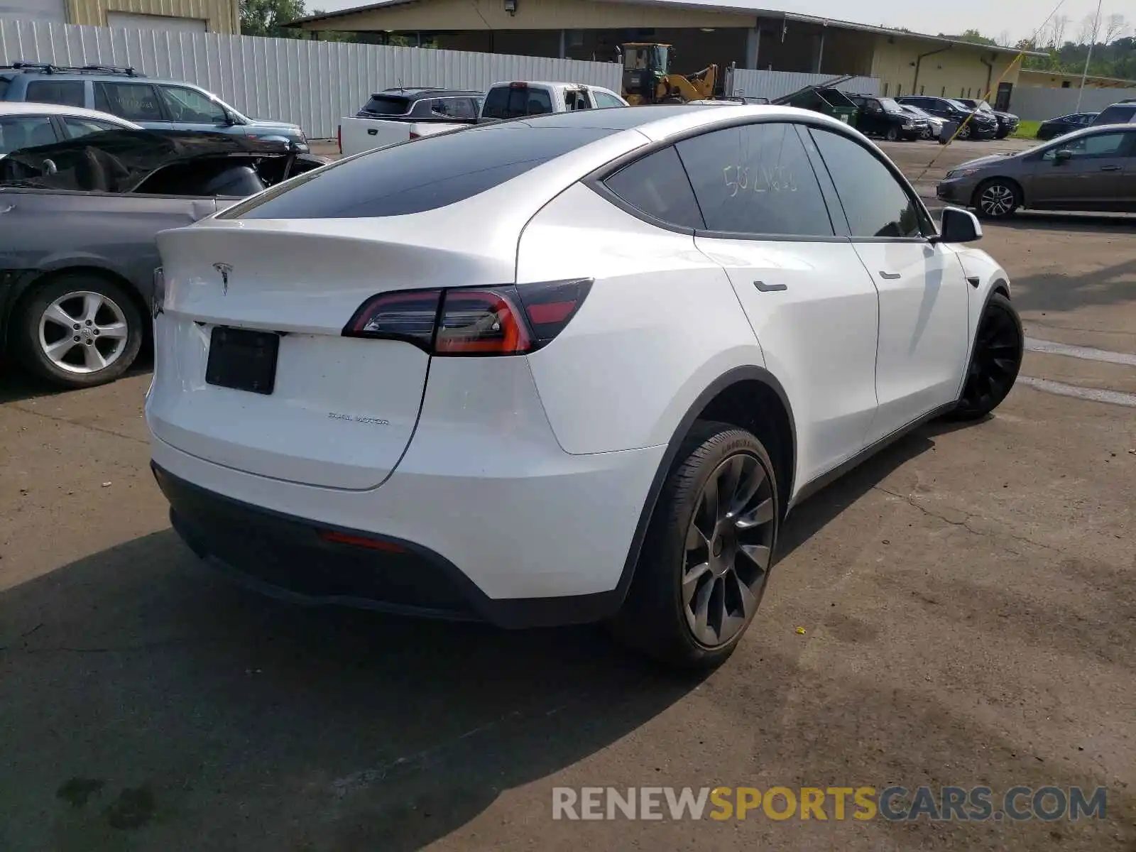 4 Photograph of a damaged car 5YJYGDEE2MF060525 TESLA MODEL Y 2021