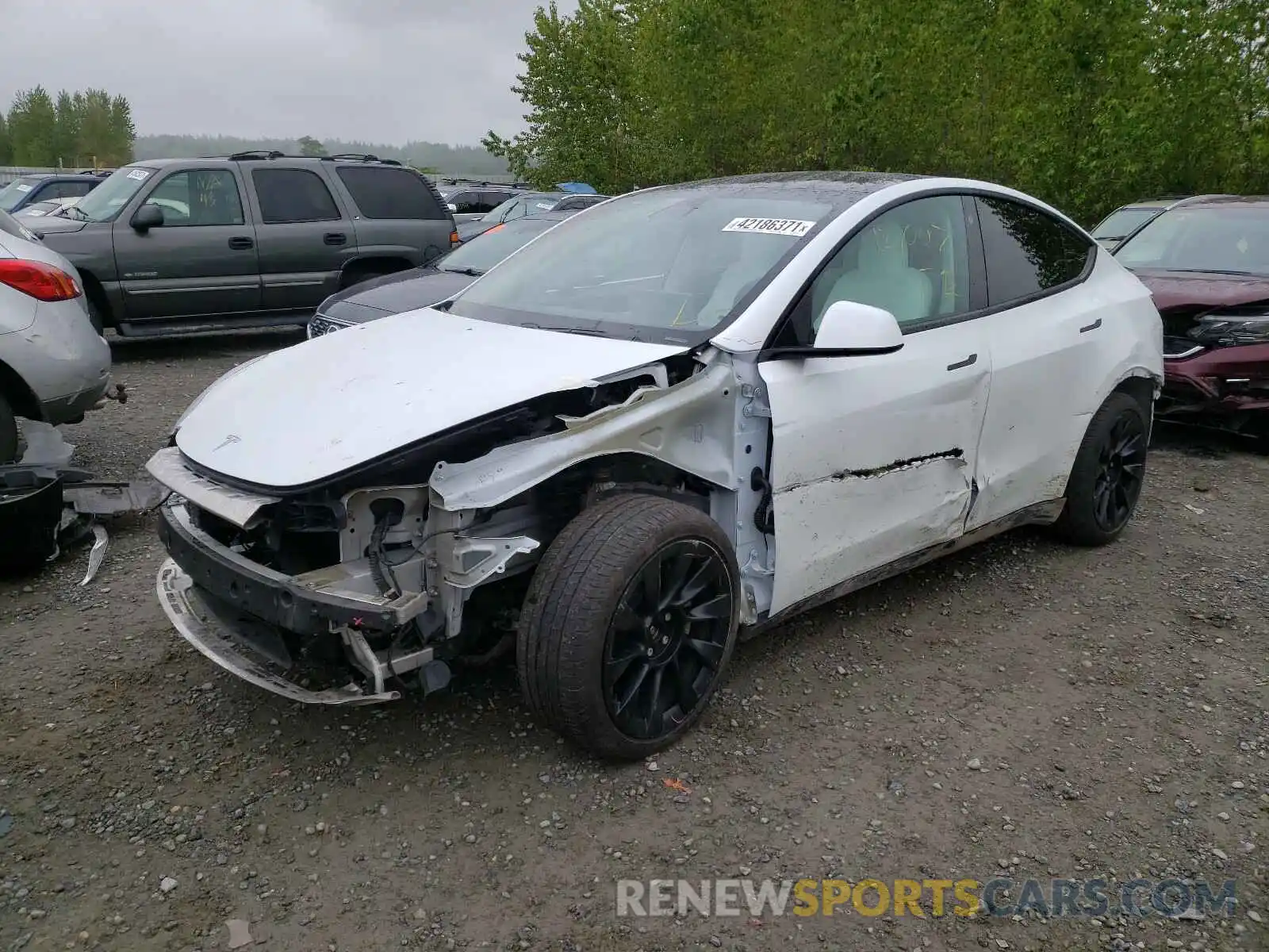 2 Photograph of a damaged car 5YJYGDEE2MF071122 TESLA MODEL Y 2021