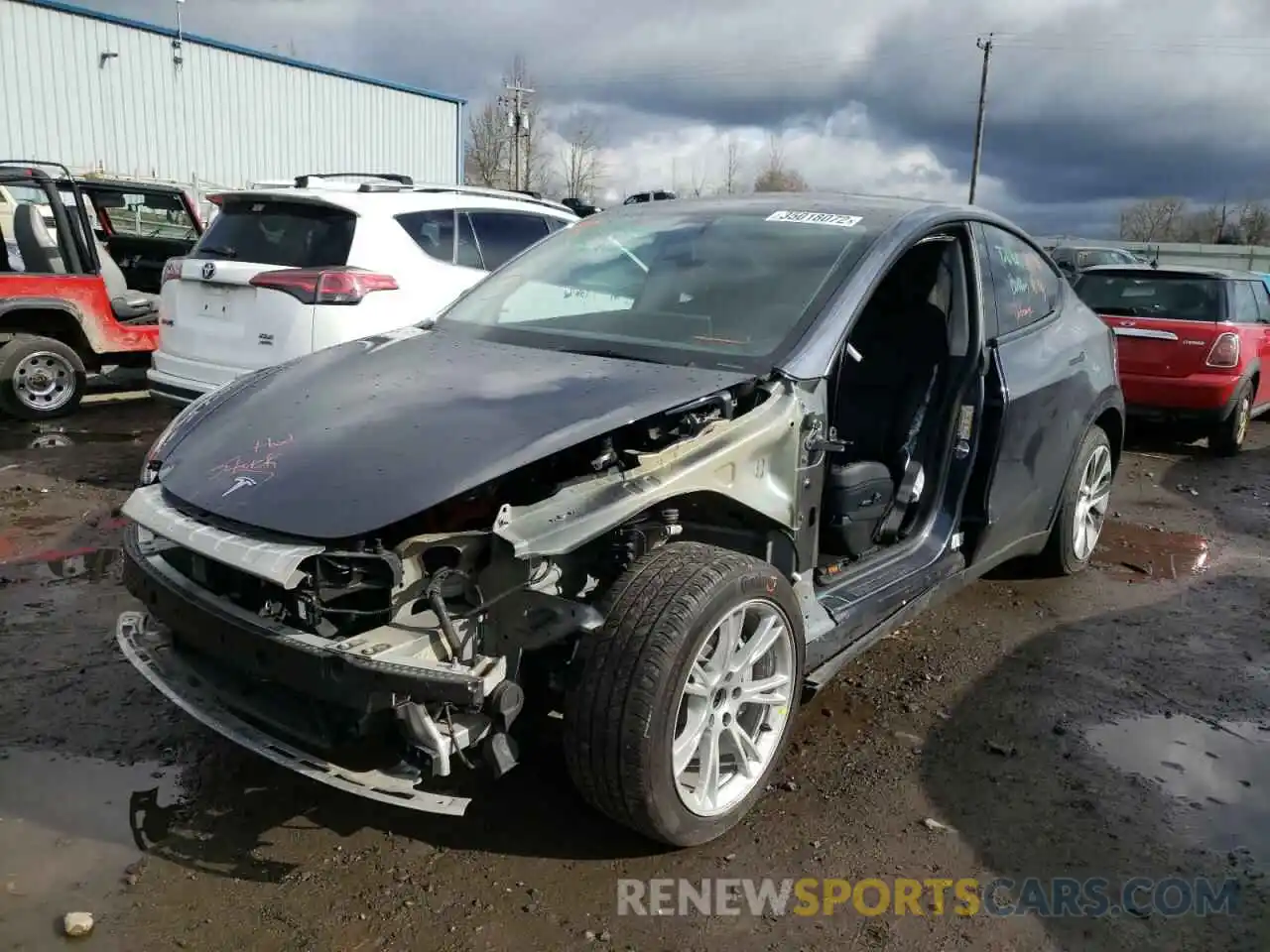 2 Photograph of a damaged car 5YJYGDEE2MF090818 TESLA MODEL Y 2021