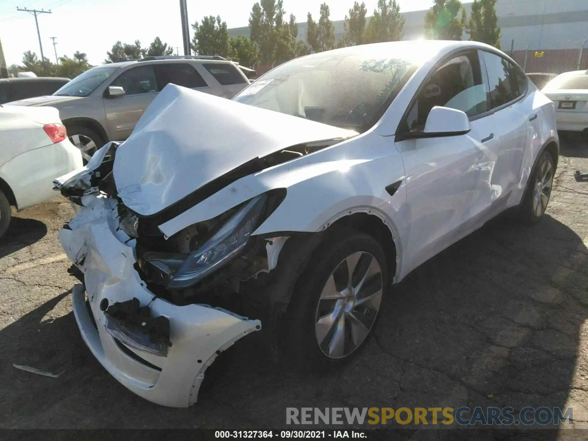 2 Photograph of a damaged car 5YJYGDEE2MF094786 TESLA MODEL Y 2021