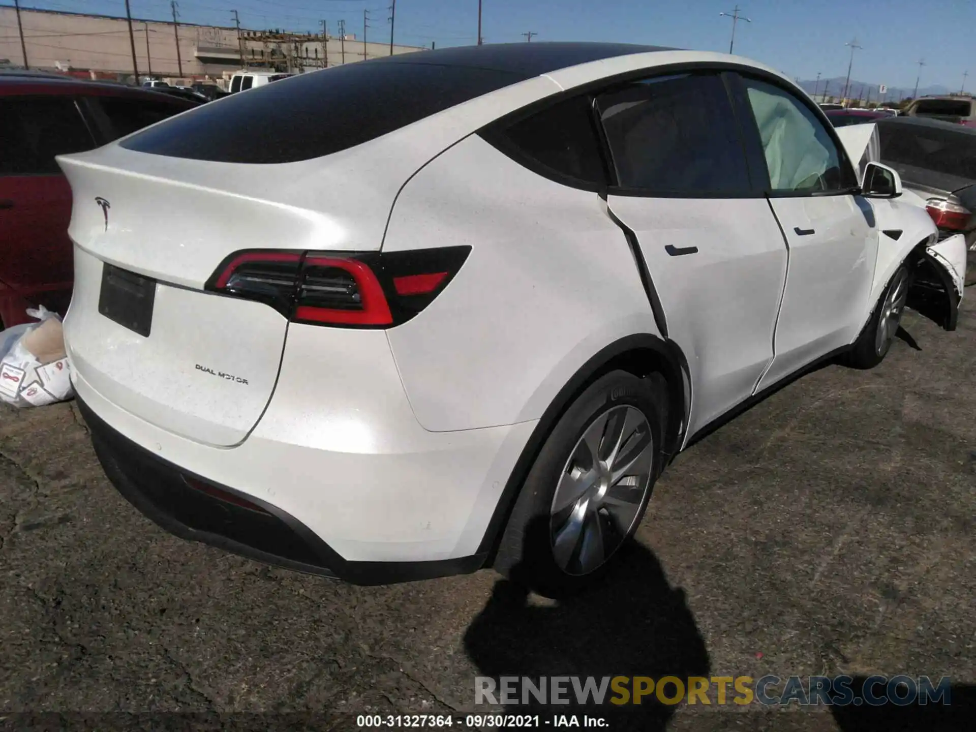 4 Photograph of a damaged car 5YJYGDEE2MF094786 TESLA MODEL Y 2021