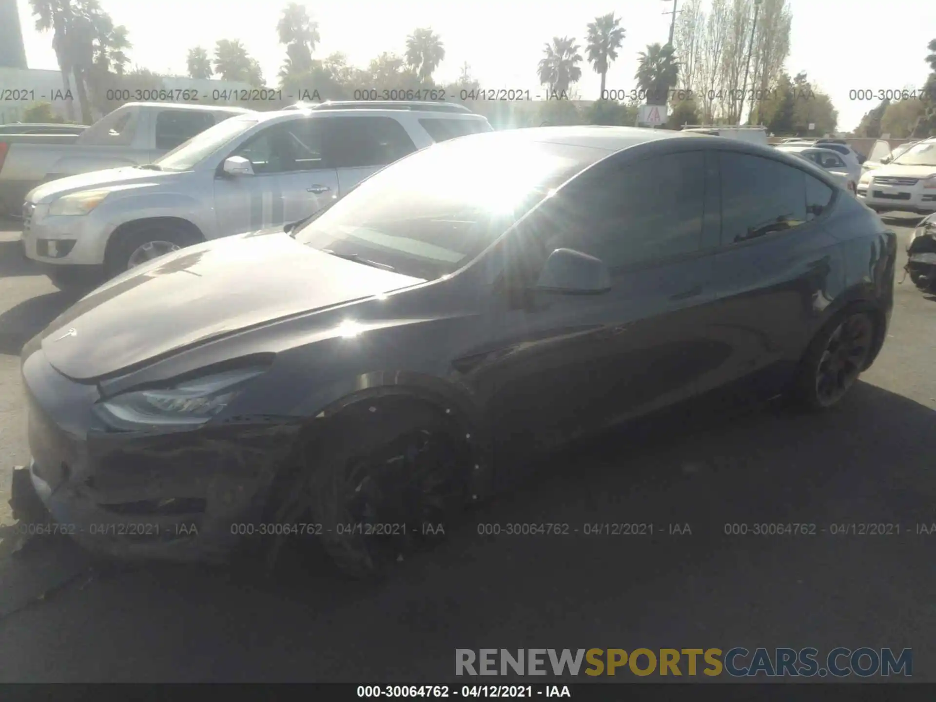 2 Photograph of a damaged car 5YJYGDEE2MF097462 TESLA MODEL Y 2021