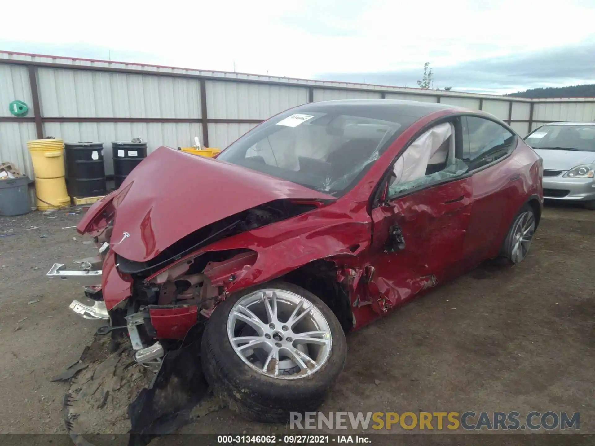 2 Photograph of a damaged car 5YJYGDEE2MF124837 TESLA MODEL Y 2021