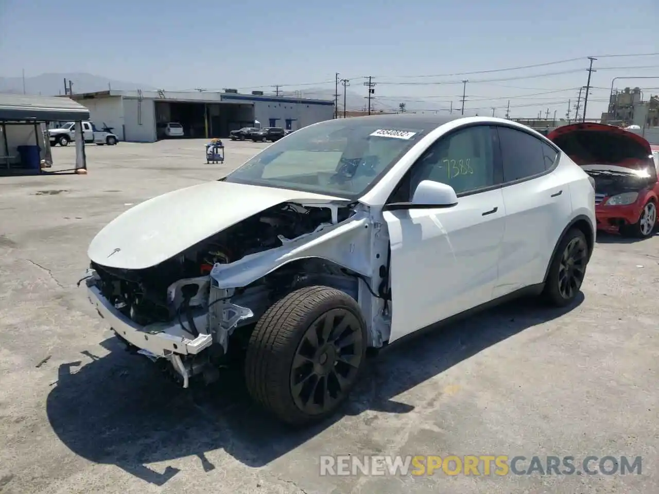 2 Photograph of a damaged car 5YJYGDEE2MF195696 TESLA MODEL Y 2021