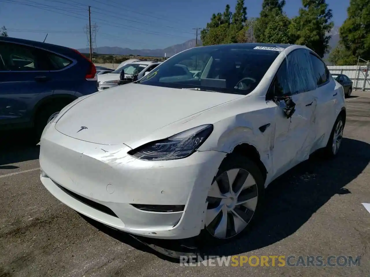 2 Photograph of a damaged car 5YJYGDEE2MF231502 TESLA MODEL Y 2021