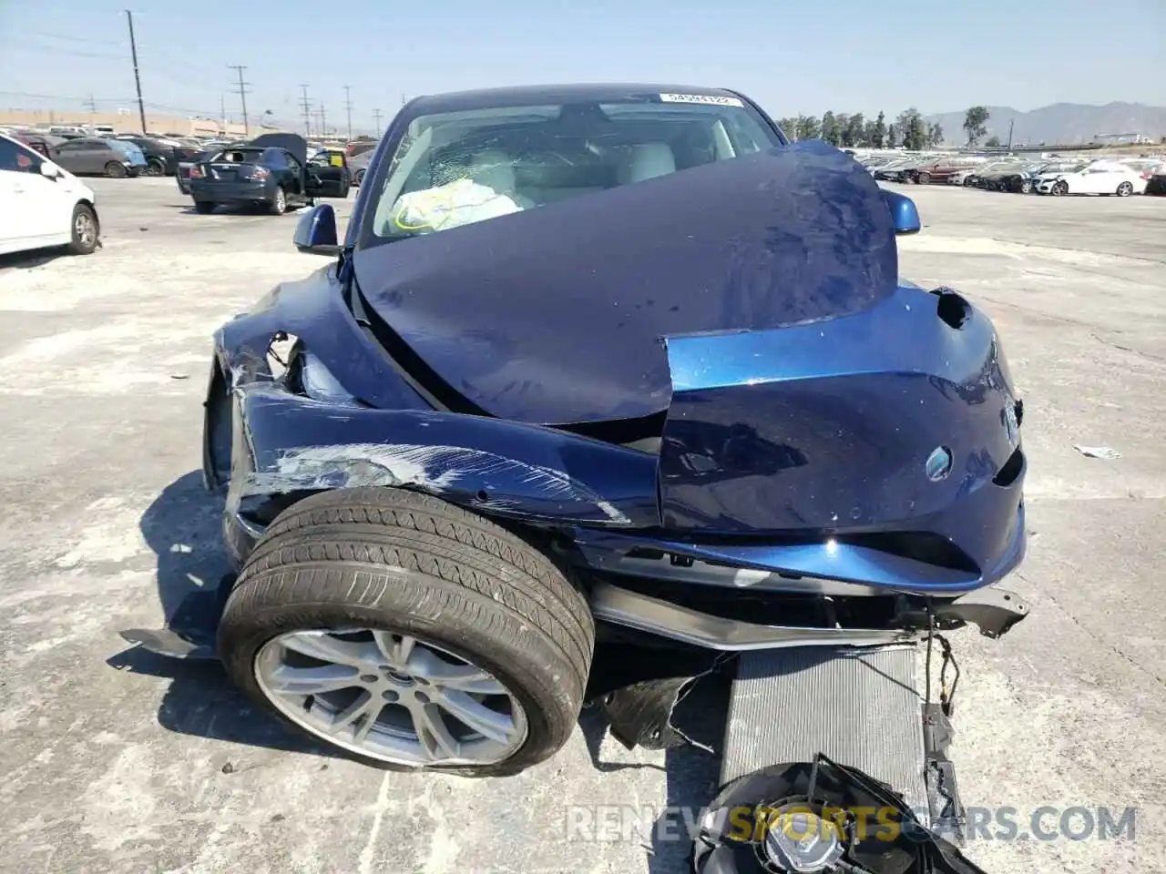 9 Photograph of a damaged car 5YJYGDEE2MF273989 TESLA MODEL Y 2021