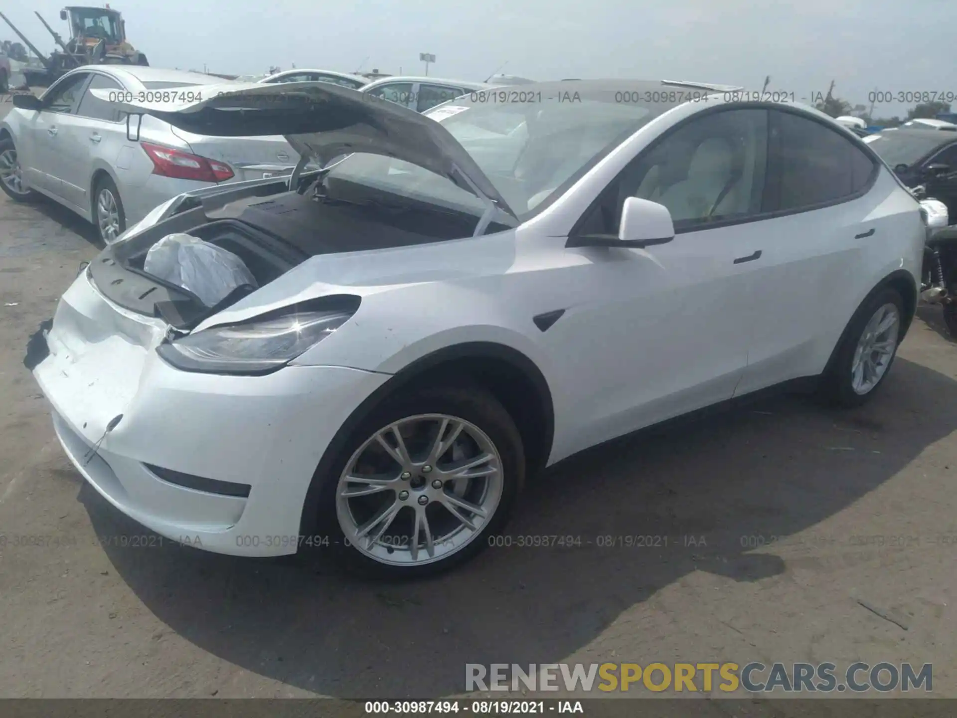 2 Photograph of a damaged car 5YJYGDEE3MF075177 TESLA MODEL Y 2021