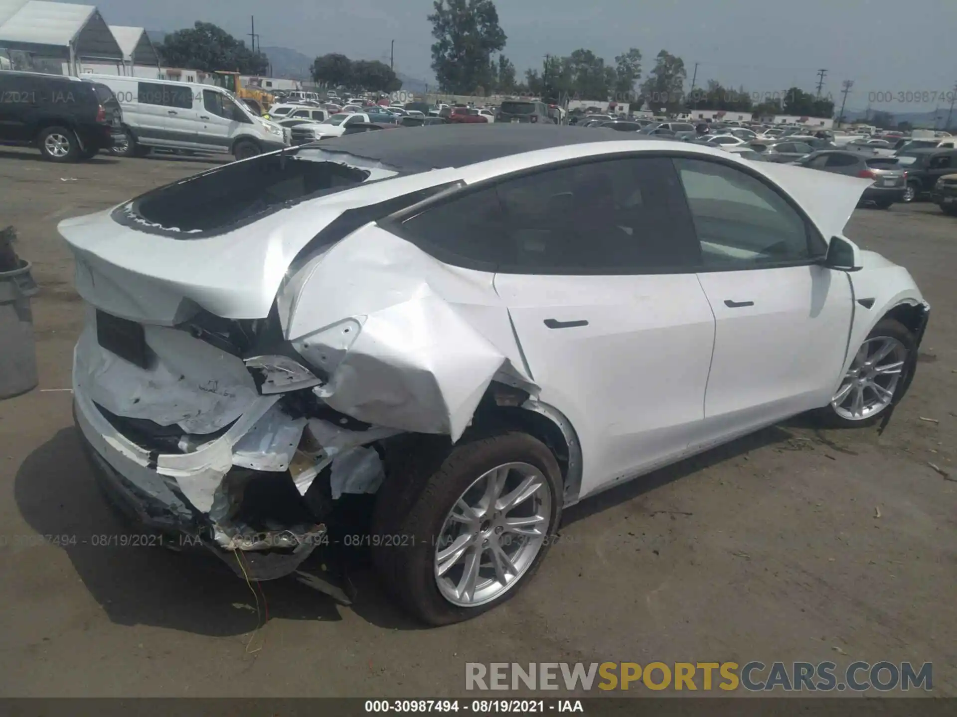 4 Photograph of a damaged car 5YJYGDEE3MF075177 TESLA MODEL Y 2021