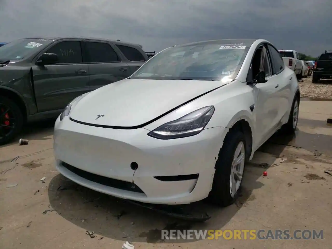 2 Photograph of a damaged car 5YJYGDEE3MF086504 TESLA MODEL Y 2021