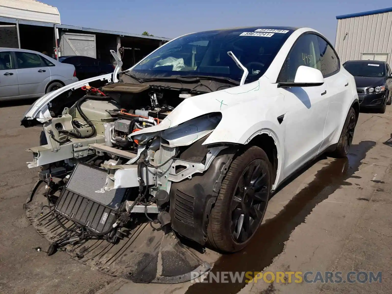 2 Photograph of a damaged car 5YJYGDEE3MF115404 TESLA MODEL Y 2021