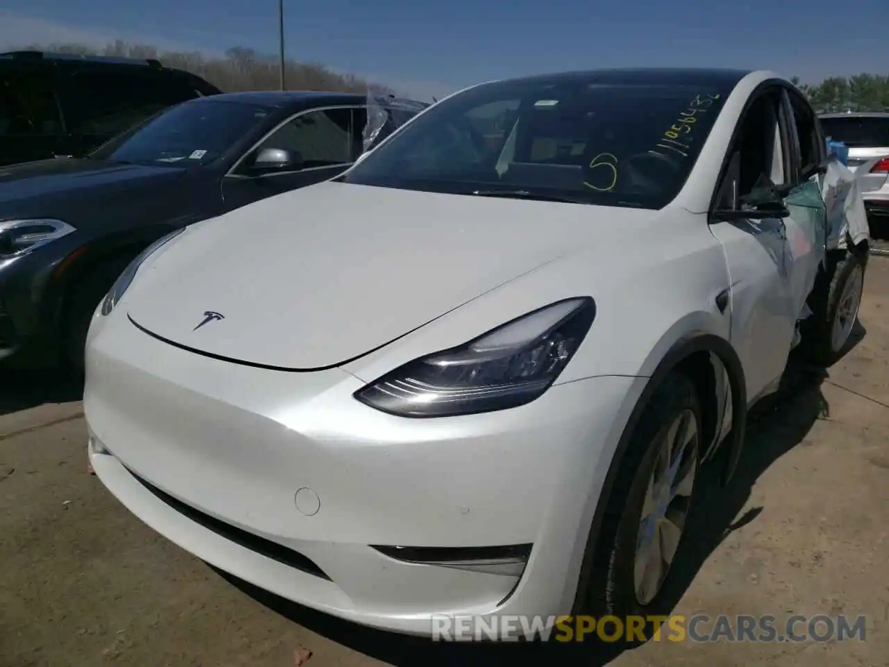 2 Photograph of a damaged car 5YJYGDEE3MF122420 TESLA MODEL Y 2021