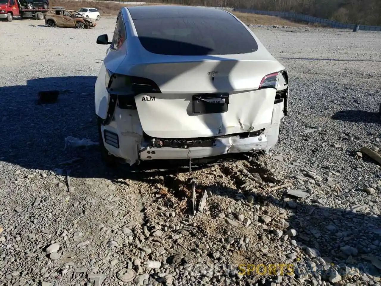 9 Photograph of a damaged car 5YJYGDEE3MF130582 TESLA MODEL Y 2021