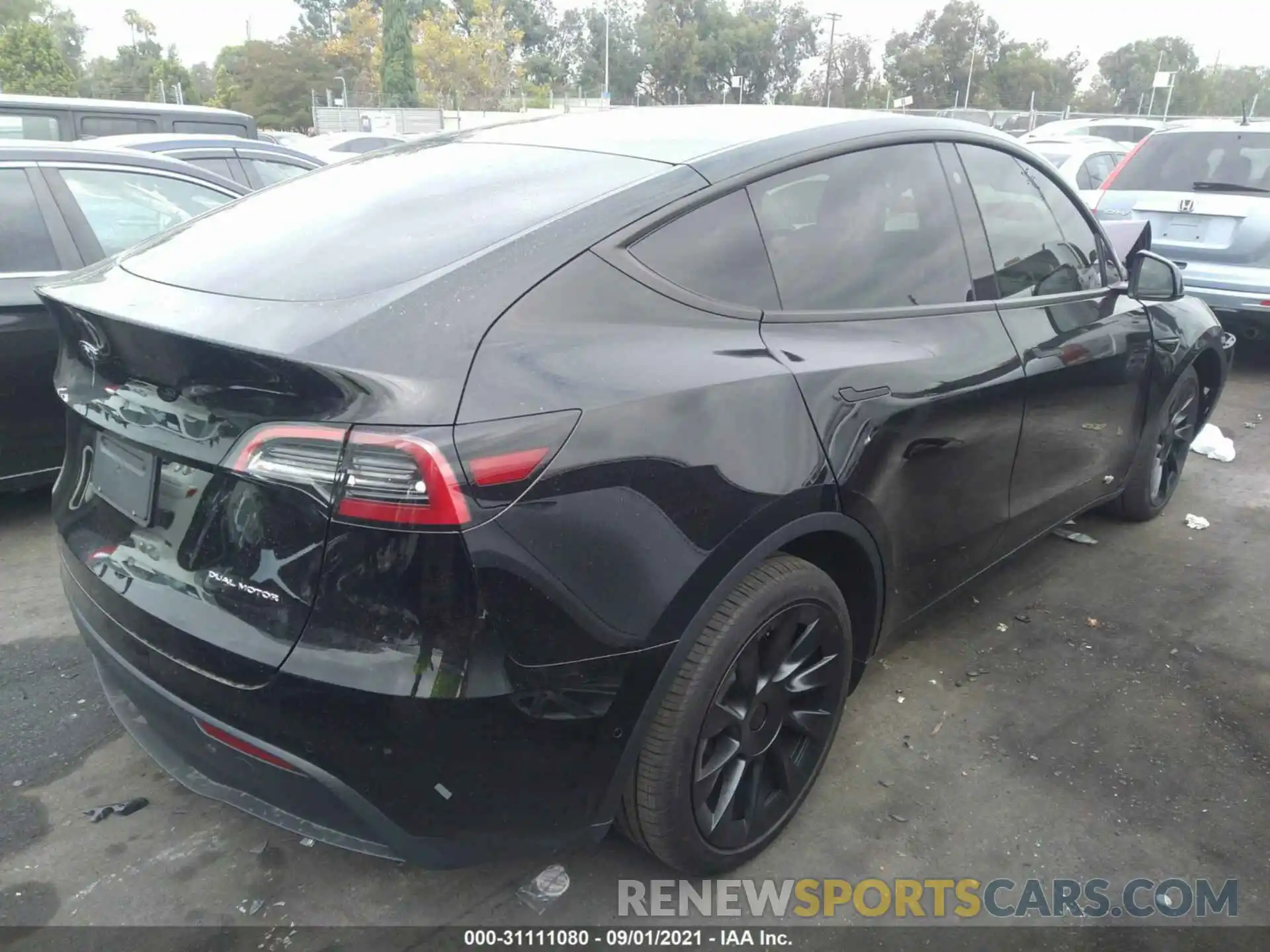 4 Photograph of a damaged car 5YJYGDEE3MF207256 TESLA MODEL Y 2021